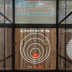 Axe throwing machine, ready for the ultimate challenge at Corky's Gaming Bistro.